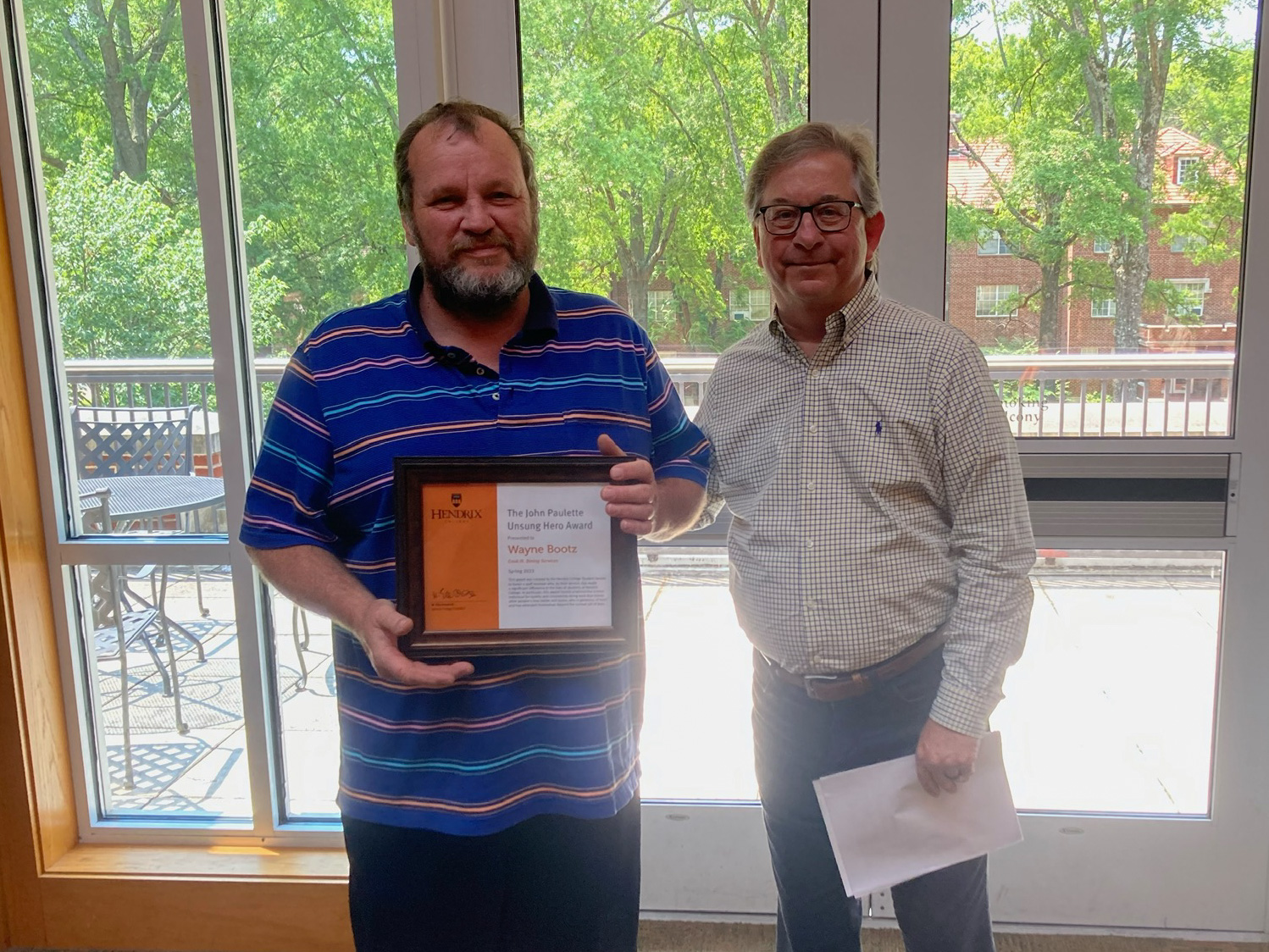 Wayne Bootz, recipient of the 2023 John Paulette Unsung Hero Award, with President Arnold